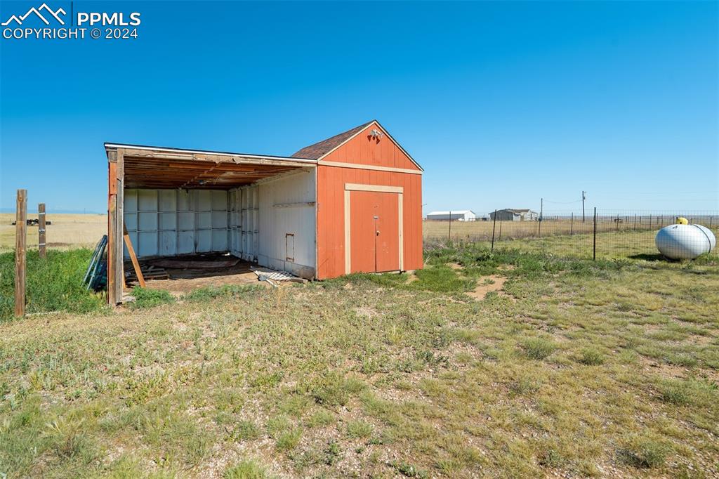 6240 Night Train Lane Yoder, CO 80864 - Photo 45 of 50 a backyard of a house