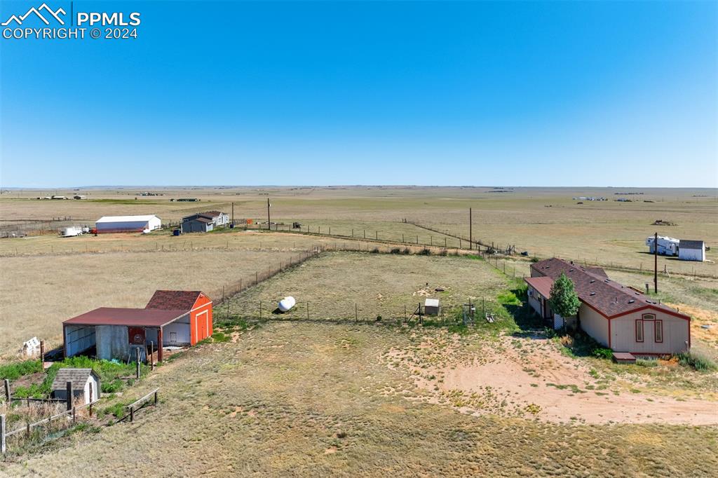 6240 Night Train Lane Yoder, CO 80864 - Photo 47 of 50 an aerial view of residential houses with outdoor space