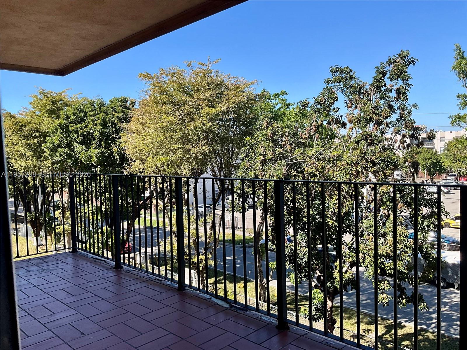 1910 West 56th Street, Unit 3302 Hialeah, FL 33012 - Photo 4 of 19 a view of a black gate