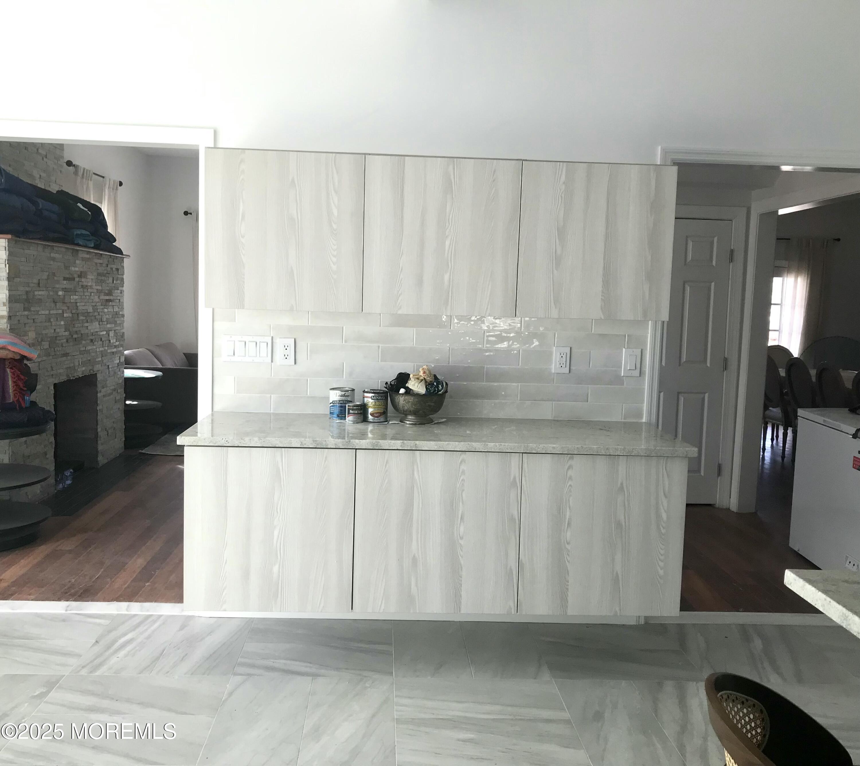11 Lakeview Road Deal, NJ 07723 - Photo 11 of 15 a view of kitchen with furniture and wooden floor