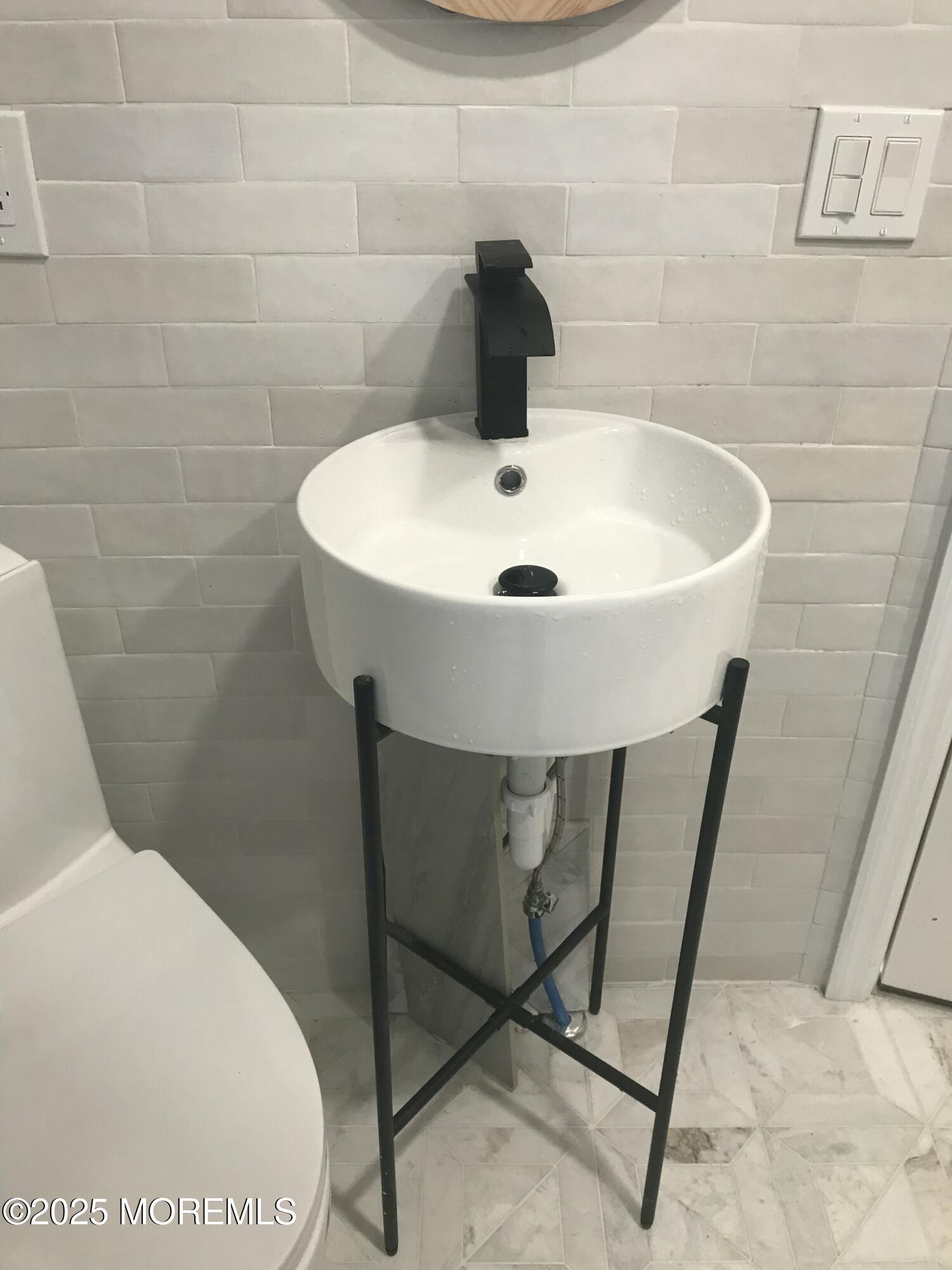 11 Lakeview Road Deal, NJ 07723 - Photo 15 of 15 a bathroom with a sink and toilet