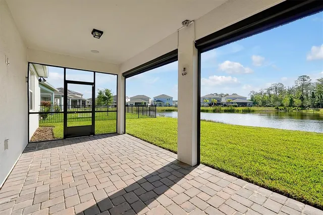 a view of a floor and wooden floor in a yard next to a yard
