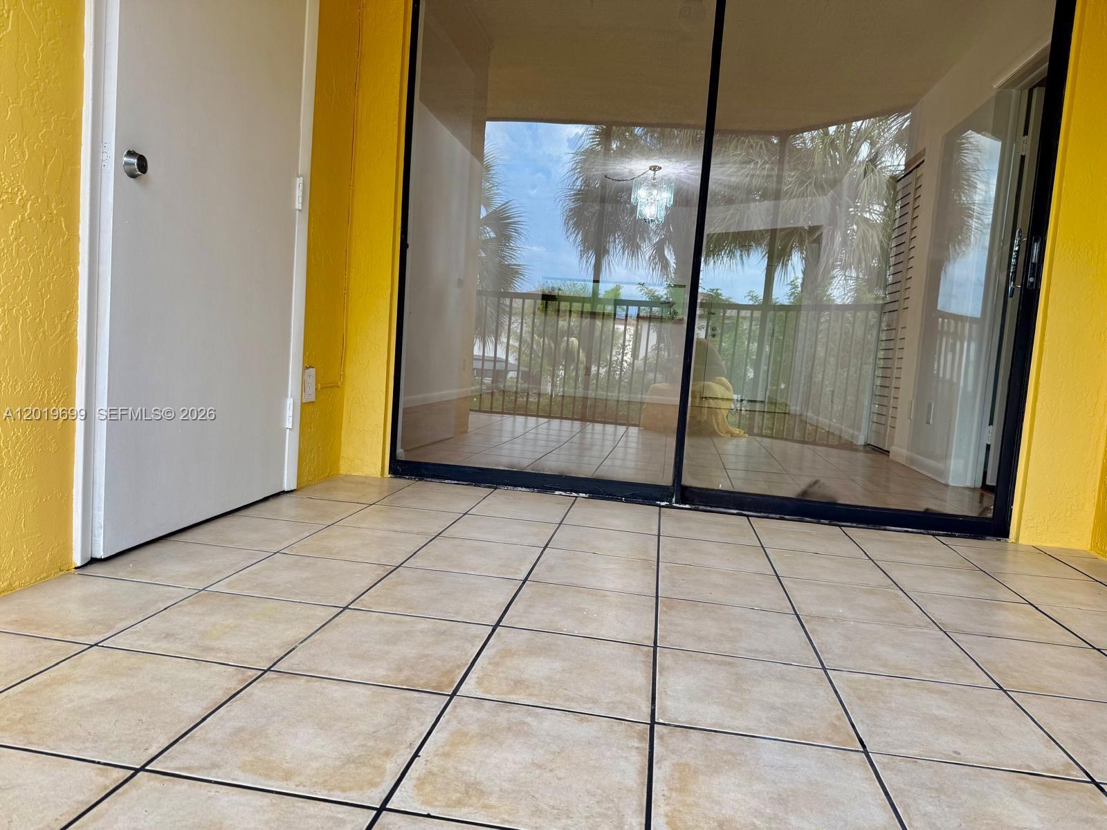 3470 Foxcroft Road, Unit 204 Miramar, FL 33025 - Photo 33 of 40 a view of empty room with wooden floor