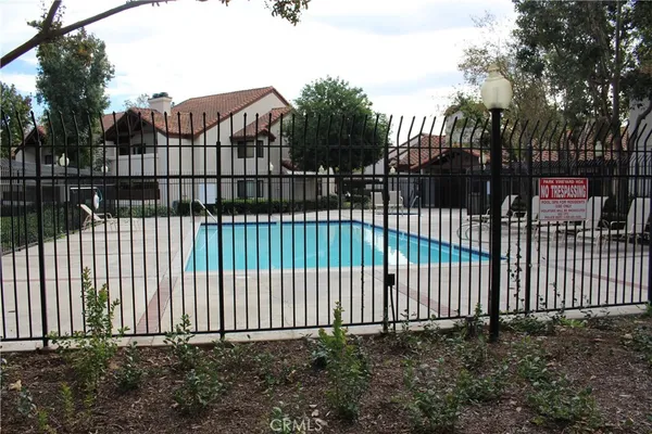 a view of balcony and trees