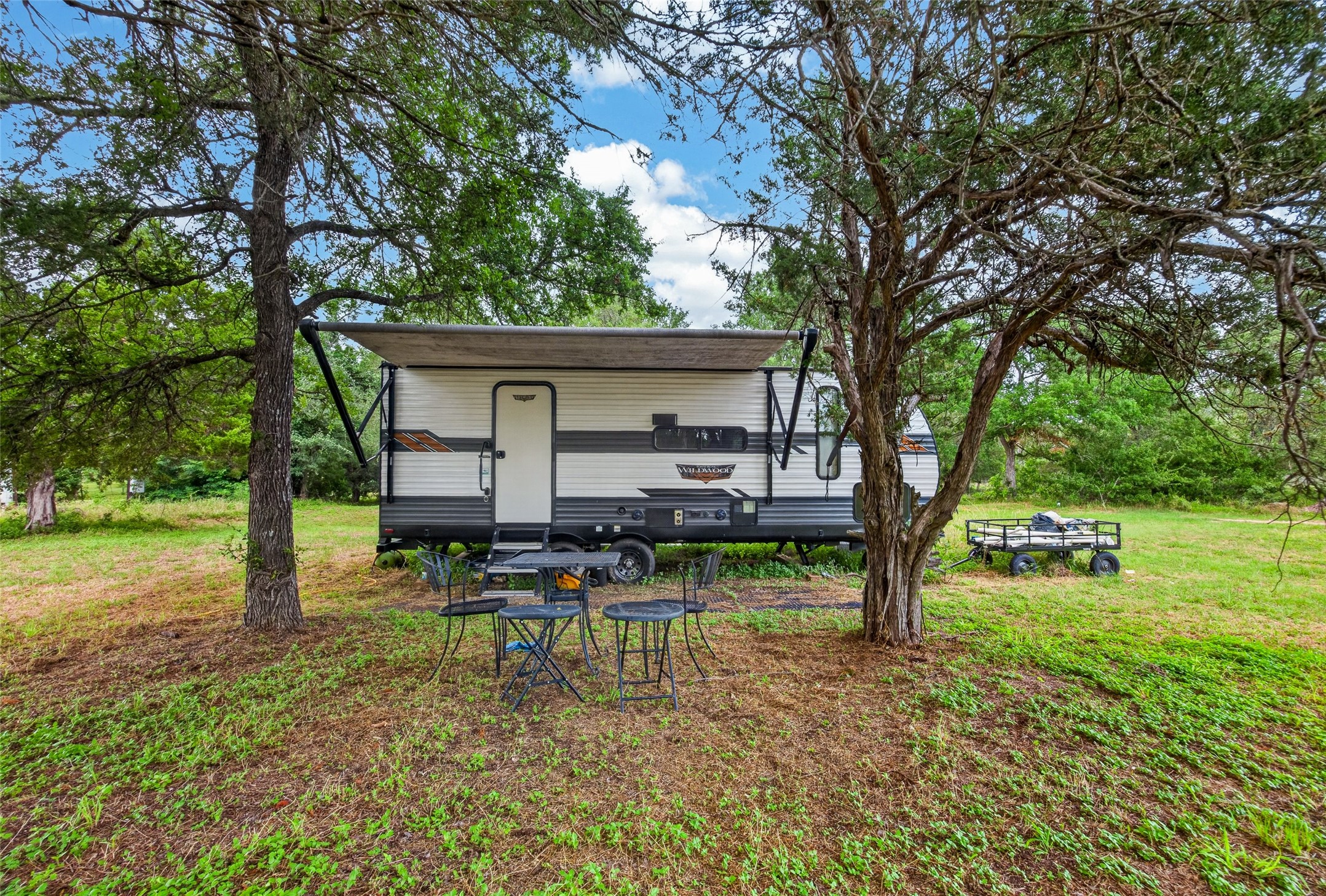 266 Beaver Road Elgin, TX 78621 - Photo 39 of 40 RV conveys with the property, creating immediate functionality and flexibility while you develop the remaining acreage.