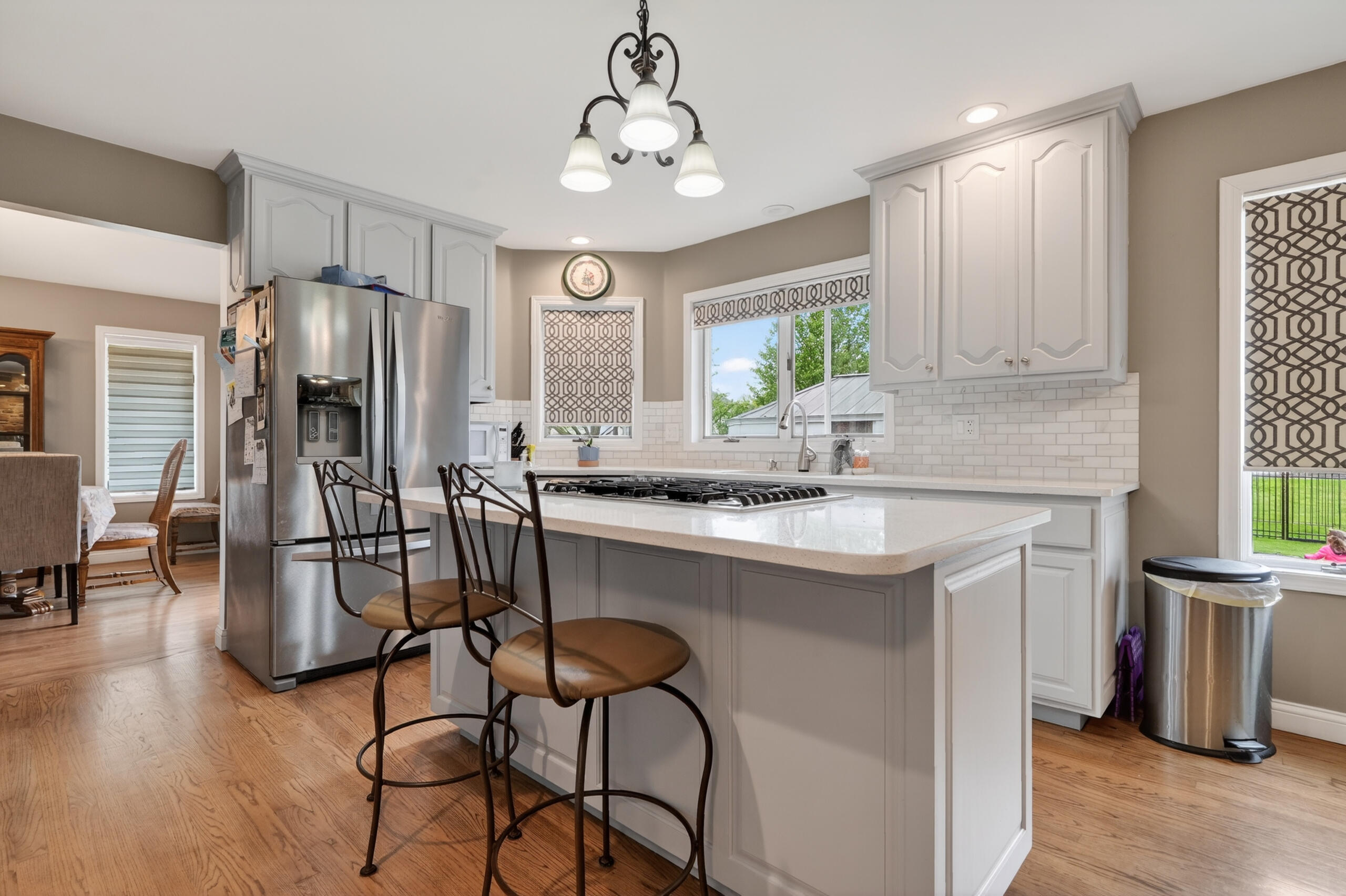 2914 Morningside Drive Crown Point, IN 46307 - Photo 12 of 41 a kitchen with stainless steel appliances granite countertop a sink refrigerator and cabinets
