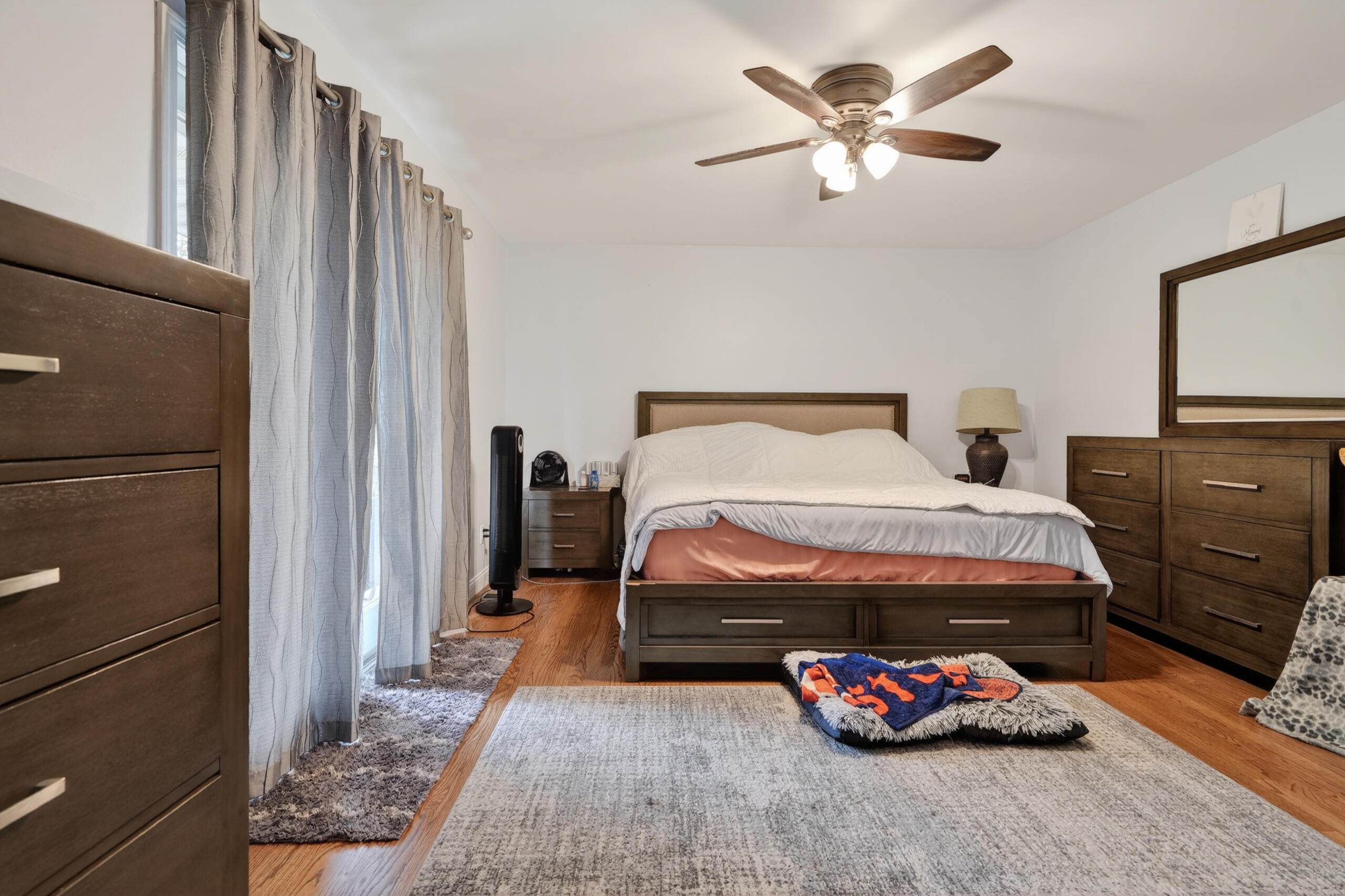 2914 Morningside Drive Crown Point, IN 46307 - Photo 23 of 41 a bedroom with a bed and a chandelier