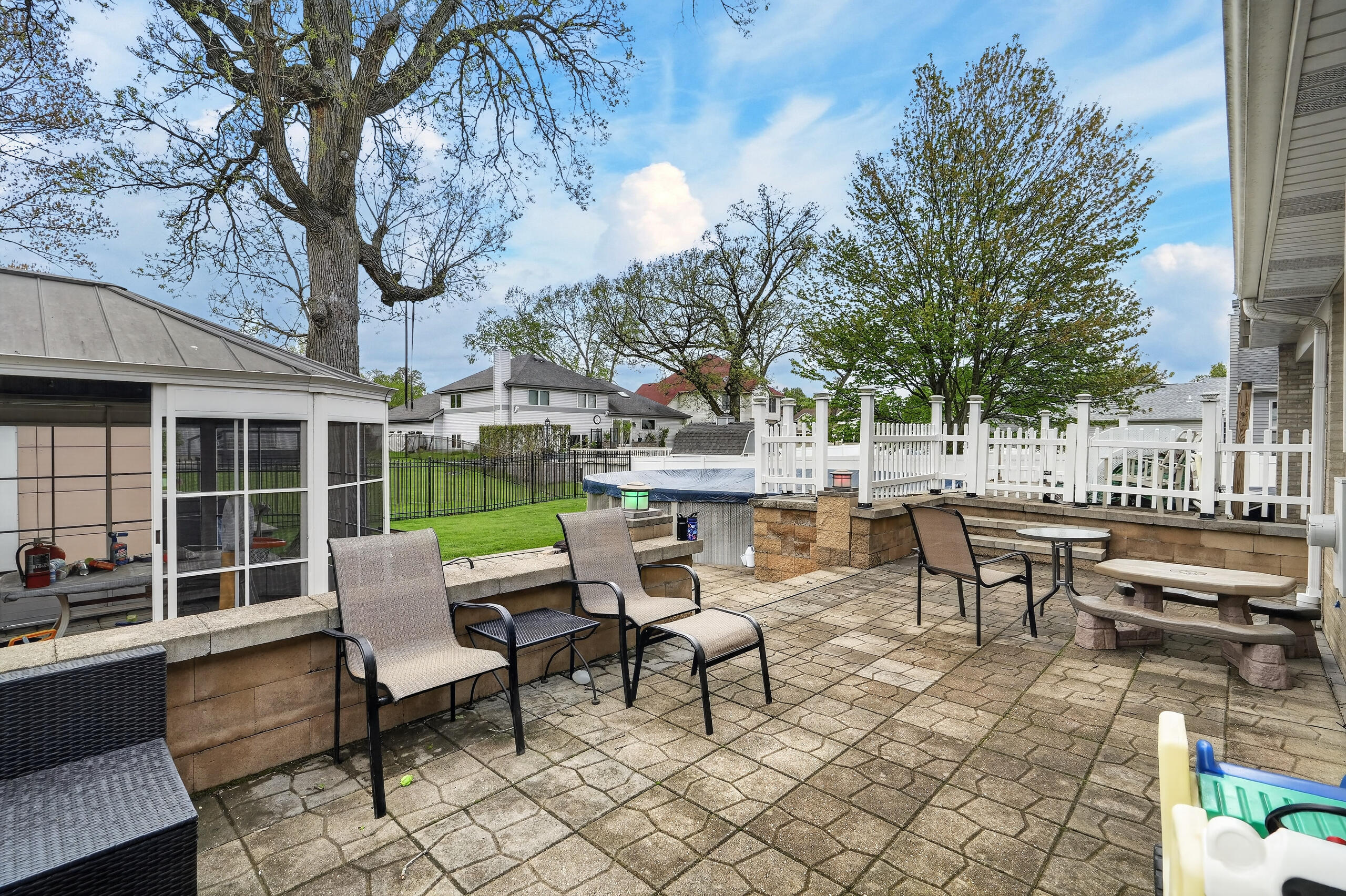 2914 Morningside Drive Crown Point, IN 46307 - Photo 32 of 41 a view of a patio with table and chairs and potted plants