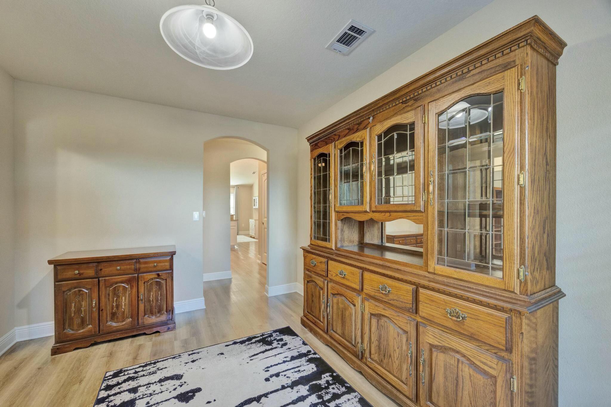 3278 Main Street Navarre, FL 32566 - Photo 11 of 43 a view of a bedroom with furniture and windows
