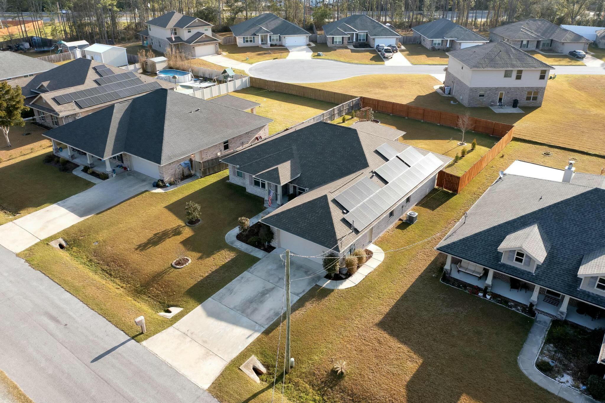3278 Main Street Navarre, FL 32566 - Photo 40 of 43 an aerial view of a pool