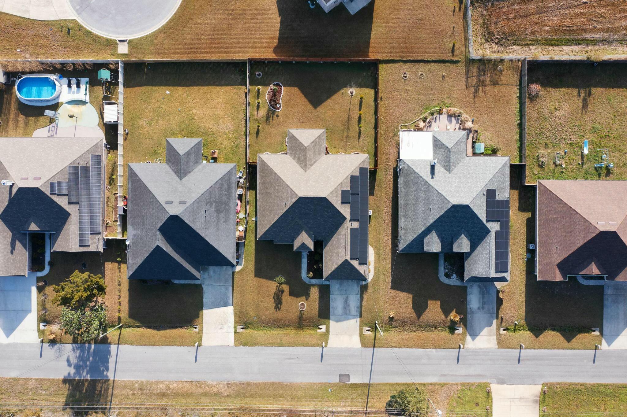 3278 Main Street Navarre, FL 32566 - Photo 42 of 43 an aerial view of a house with swimming pool