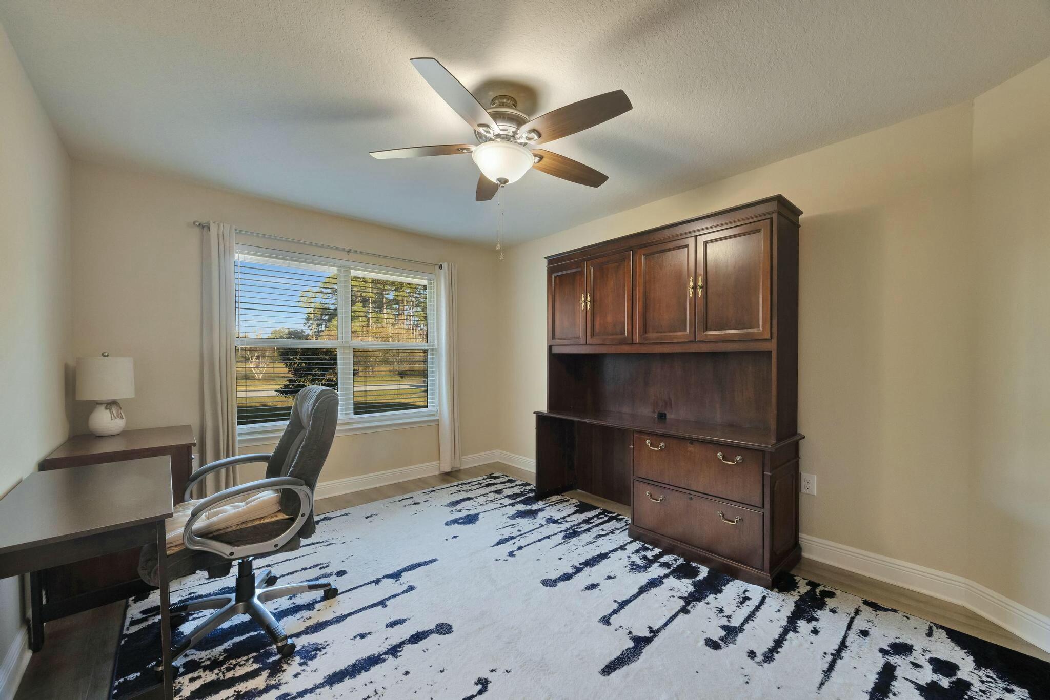 3278 Main Street Navarre, FL 32566 - Photo 9 of 43 a room with furniture