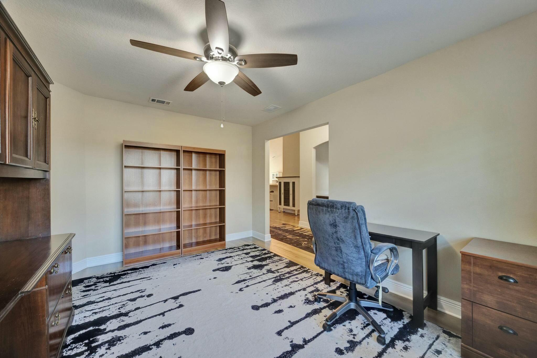 3278 Main Street Navarre, FL 32566 - Photo 10 of 43 a view of livingroom with furniture and workspace