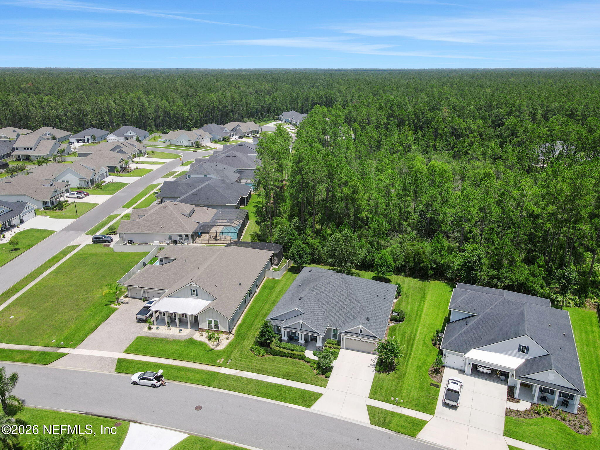 146 Clarendon Road St. Johns, FL 32259 - Photo 51 of 59 an aerial view of a house with garden space and street view