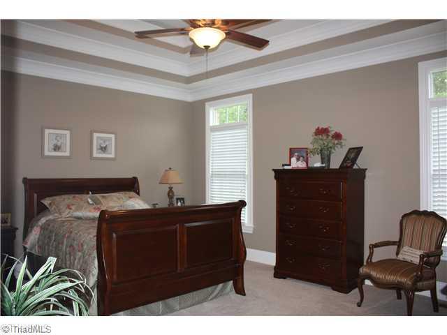 8203 Haw River Road Oak Ridge, NC 27310 - Photo 12 of 16 Master Bedroom. Huge Master Bedroom with treyed celing