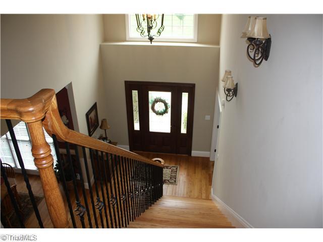 8203 Haw River Road Oak Ridge, NC 27310 - Photo 5 of 16 View. View from Upstairs - features a catwalk overlooking entry and Great Room