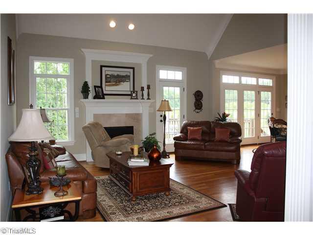8203 Haw River Road Oak Ridge, NC 27310 - Photo 16 of 16 Den/Family/Great Room. Two Story Great Room with lots of light - Open and flowing floor plan