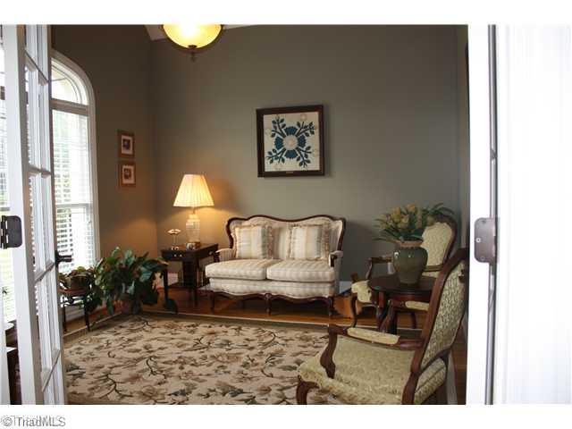 8203 Haw River Road Oak Ridge, NC 27310 - Photo 7 of 16 Living Room. Beautiful living room/Study just off the foyer with French Doors