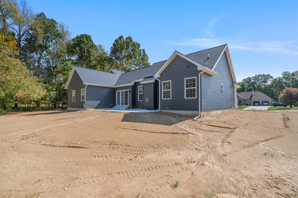 $489,900 | 5033 Ikram Oaks Lane, Jackson, MI 49201