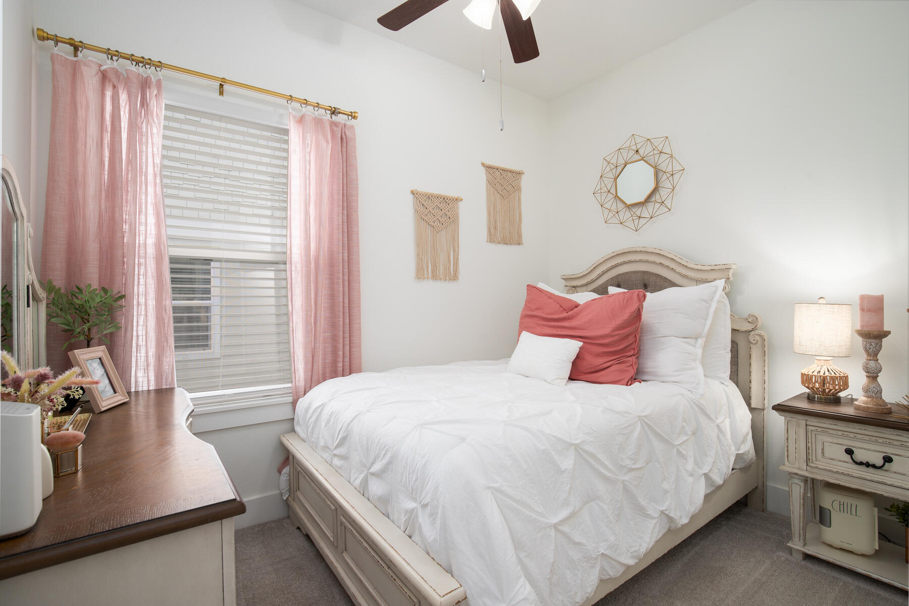 148 North Sand Palm Road Freeport, FL 32439 - Photo 12 of 17 a bedroom with a bed and a flat tv screen on the dresser