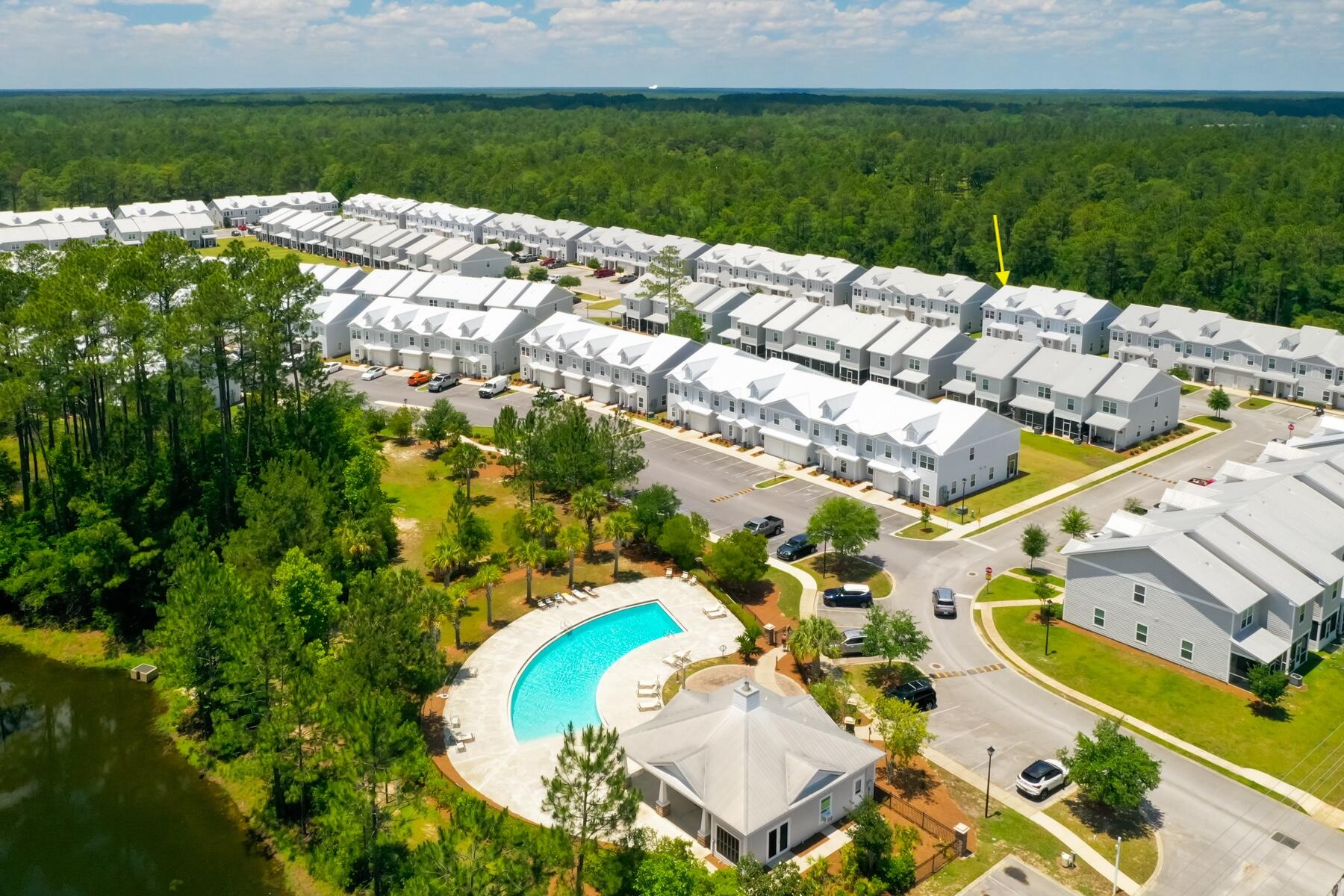 148 North Sand Palm Road Freeport, FL 32439 - Photo 17 of 17 a view of a swimming pool with a yard