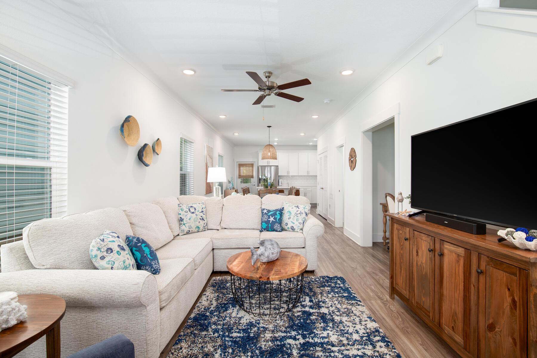 148 North Sand Palm Road Freeport, FL 32439 - Photo 3 of 17 a living room with furniture and a flat screen tv