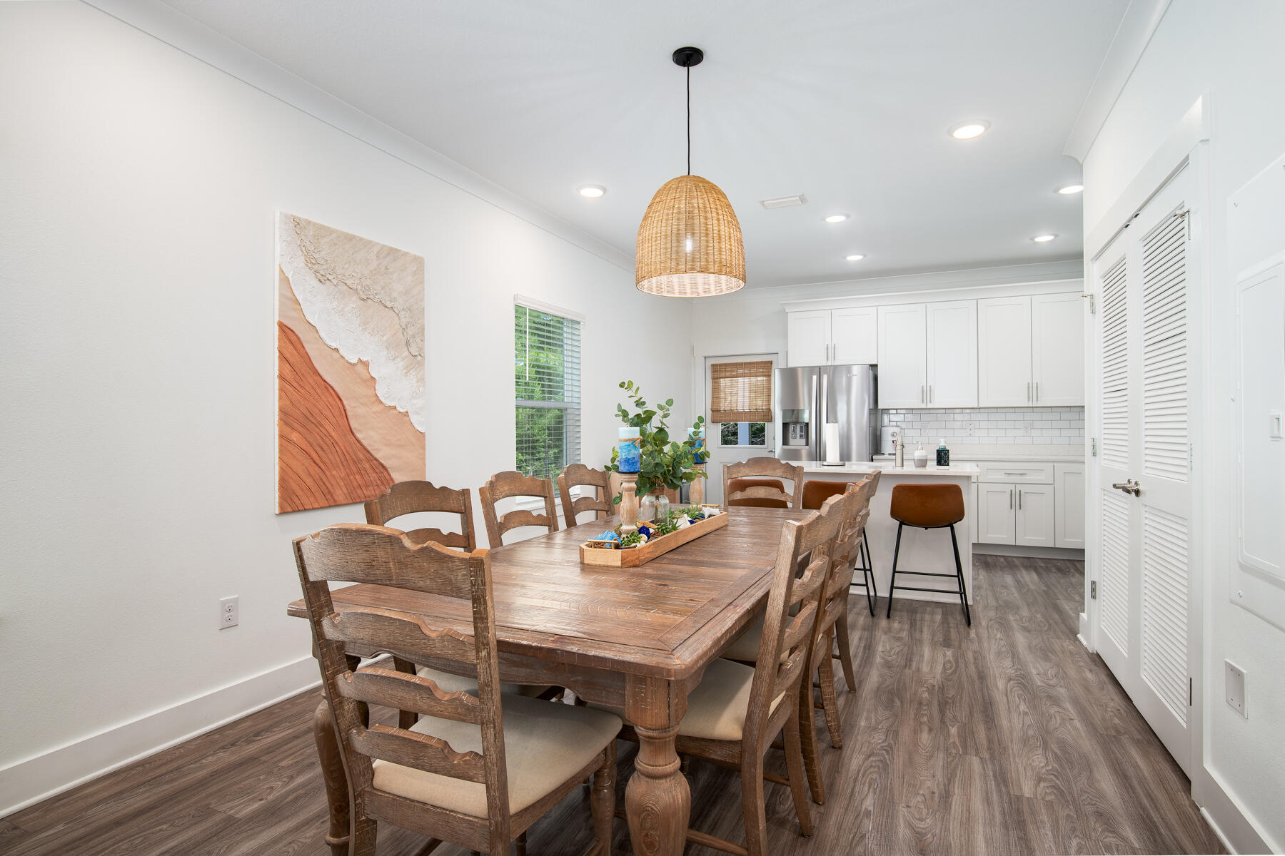 148 North Sand Palm Road Freeport, FL 32439 - Photo 5 of 17 a view of a dining room with furniture window and wooden floor