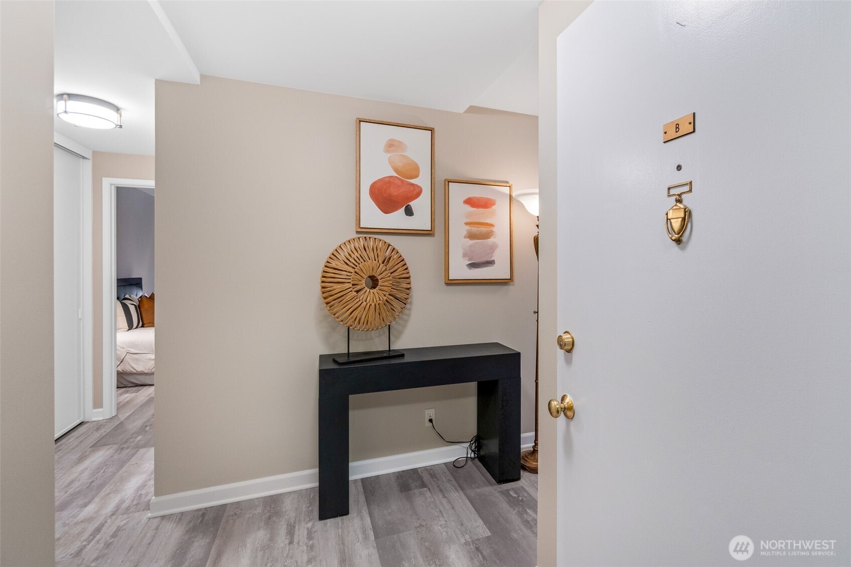 75 East Lynn Street, Unit B Seattle, WA 98102 - Photo 16 of 36 a view of an entryway with wooden floor