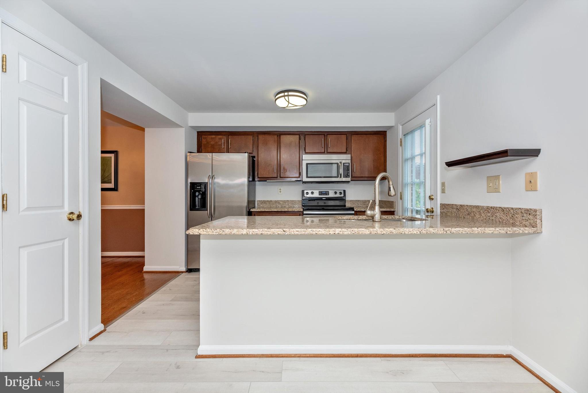 8021 Hollow Reed Court Frederick, MD 21701 - Photo 16 of 55 Kitchen with new floors