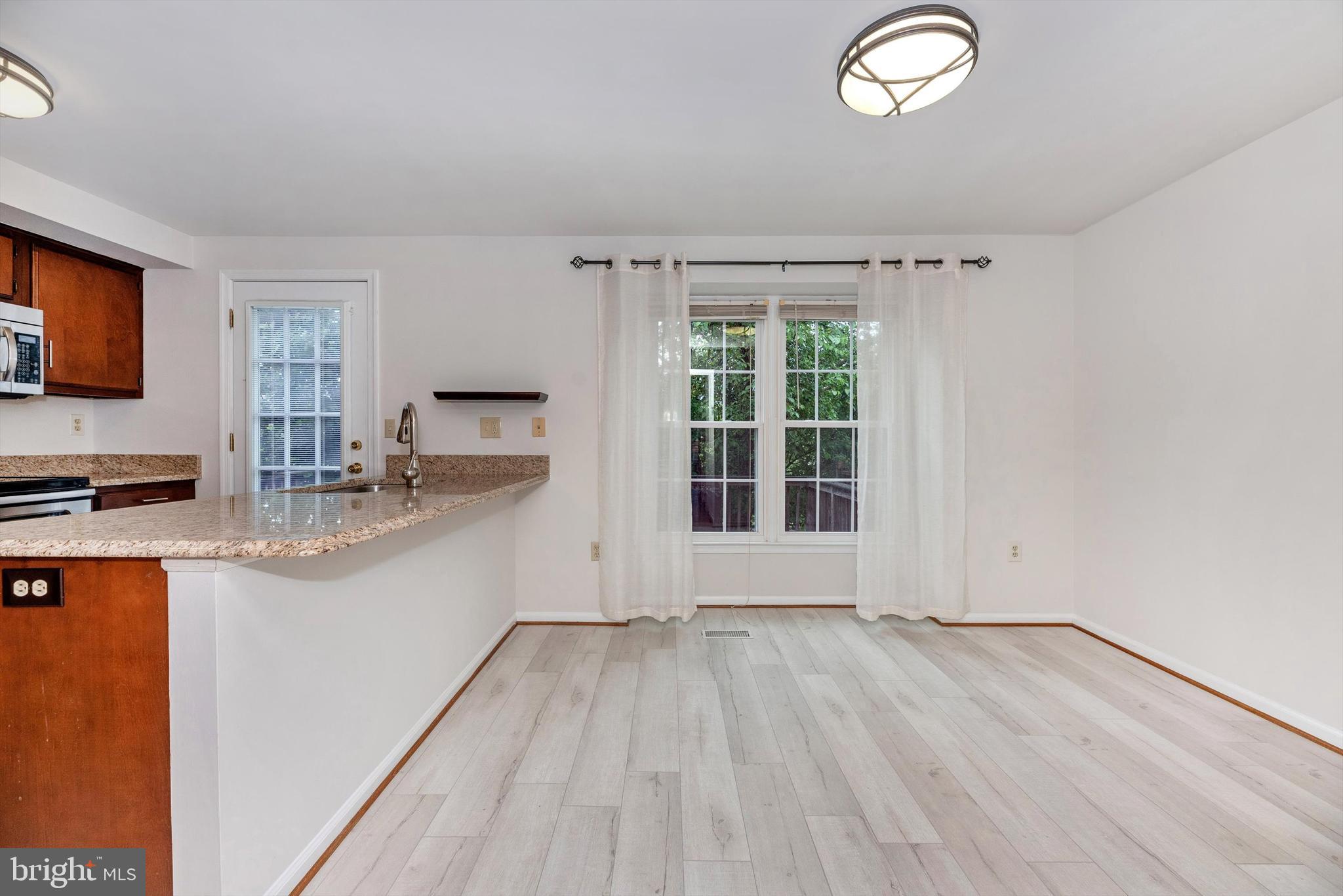 8021 Hollow Reed Court Frederick, MD 21701 - Photo 18 of 55 Gorgeous new floors in kitchen