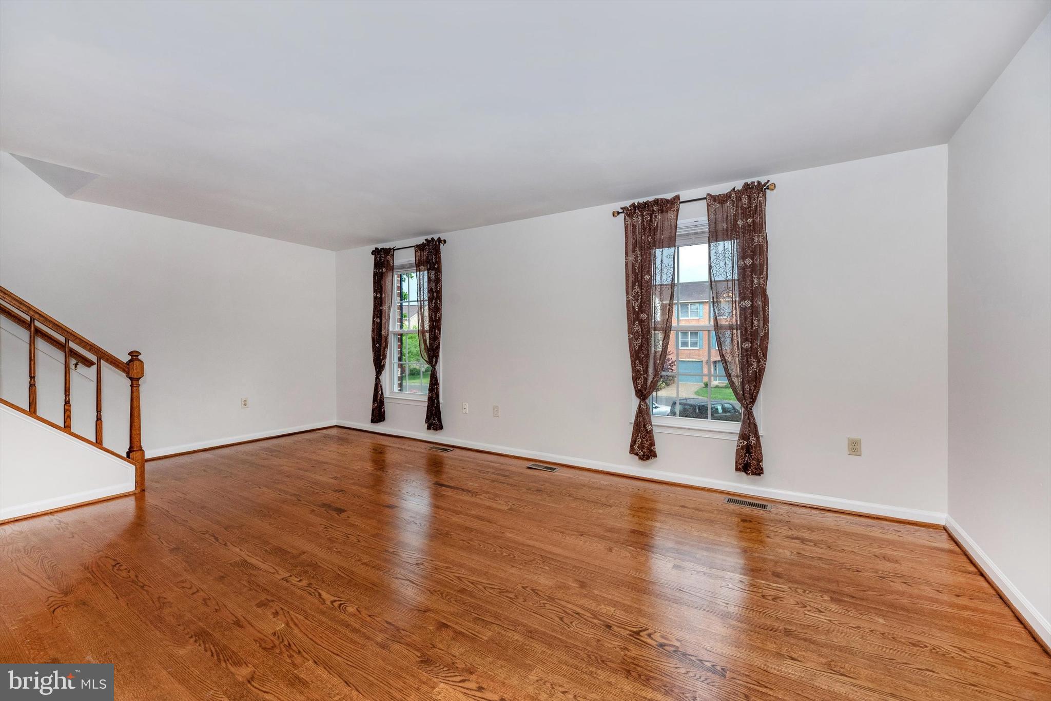8021 Hollow Reed Court Frederick, MD 21701 - Photo 9 of 55 Gleaming hardwood floors in family room