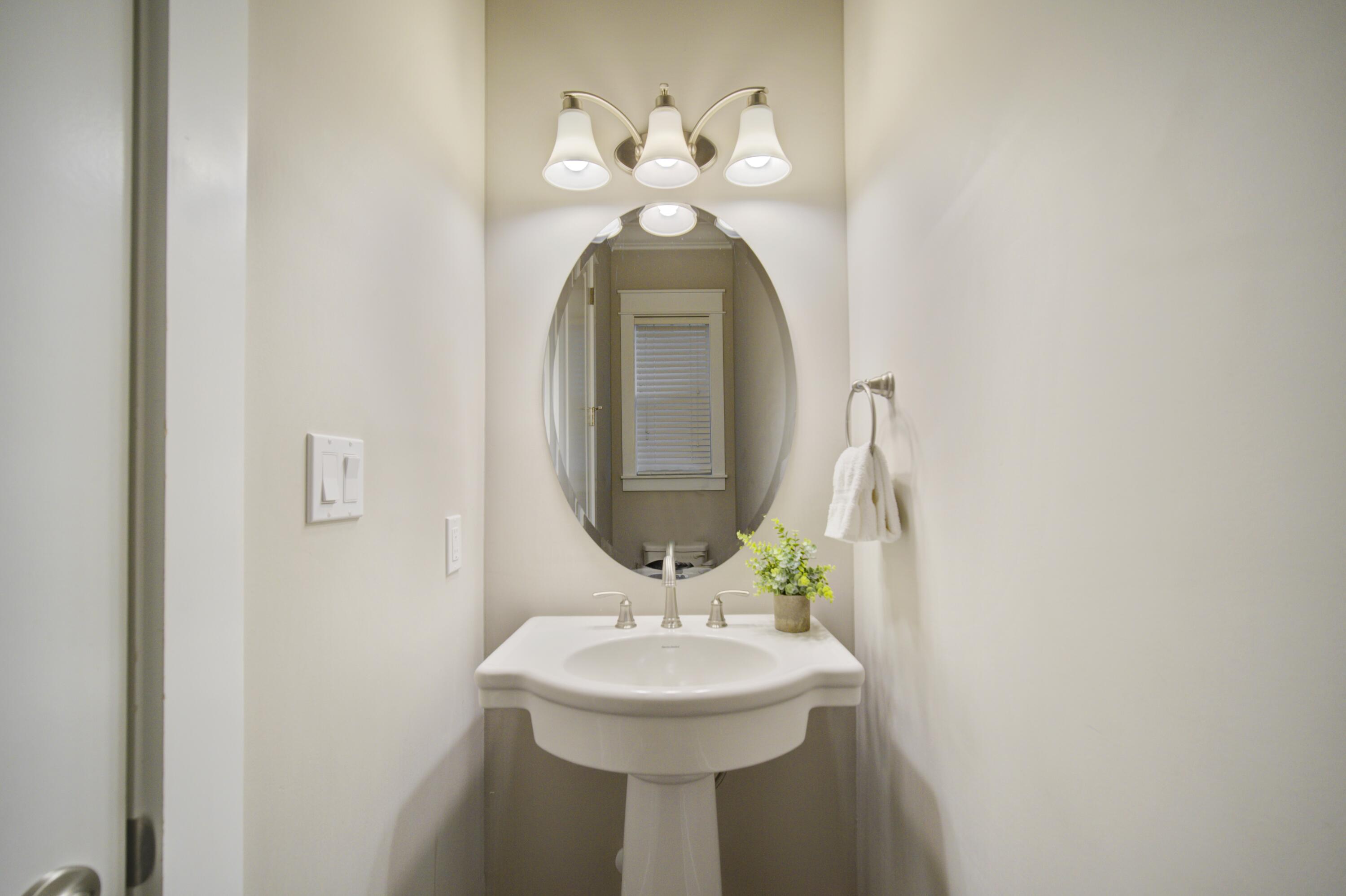 190 Okeechobee West Santa Rosa Beach, FL 32459 - Photo 20 of 71 a bathroom with a sink and a mirror