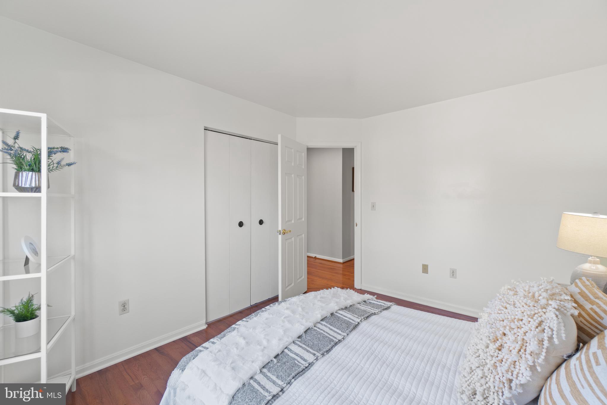 2430 Lyttonsville Road Silver Spring, MD 20910 - Photo 19 of 53 a bedroom with a bed and hallway