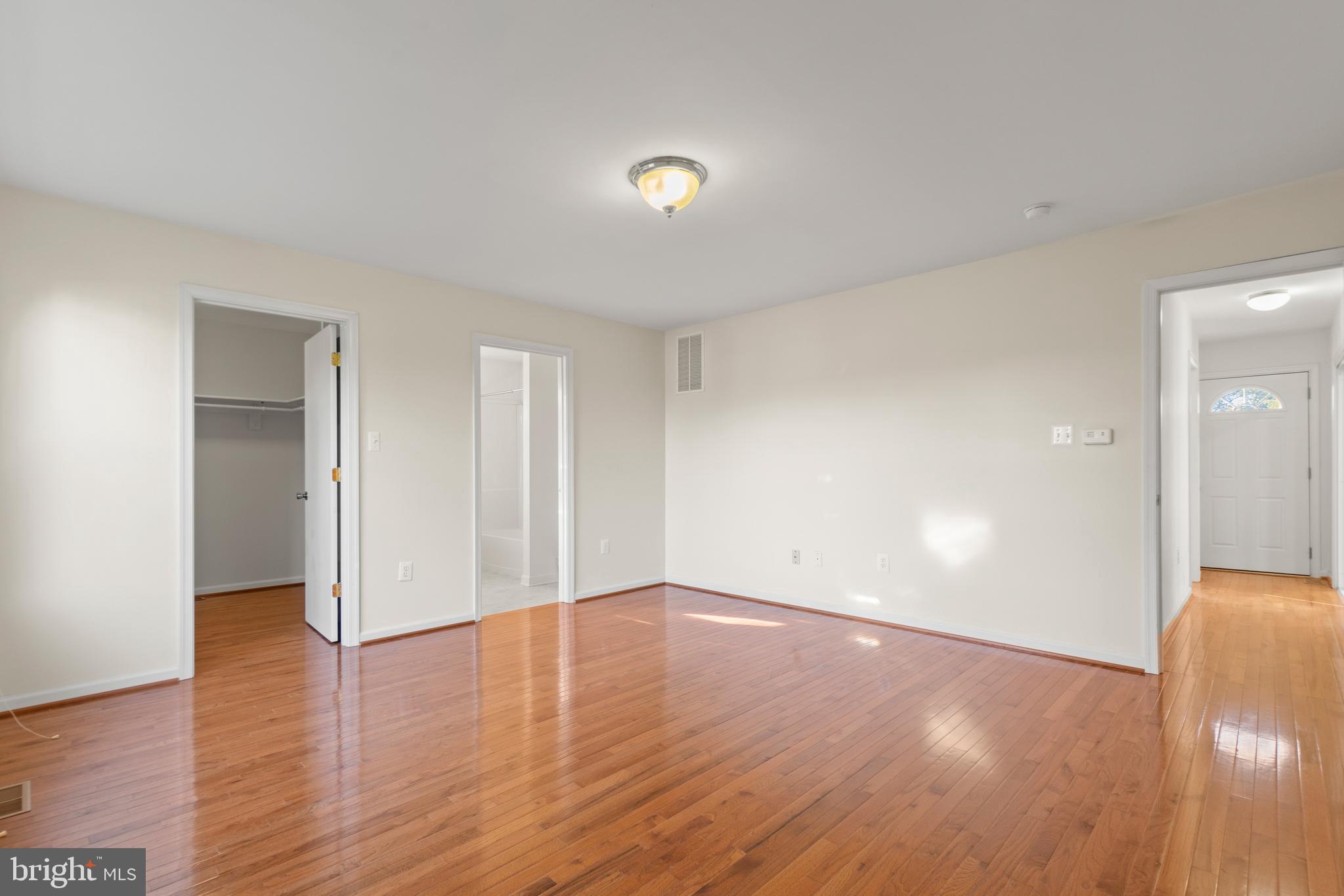 2430 Lyttonsville Road Silver Spring, MD 20910 - Photo 24 of 53 a view of an empty room with wooden floor and closet