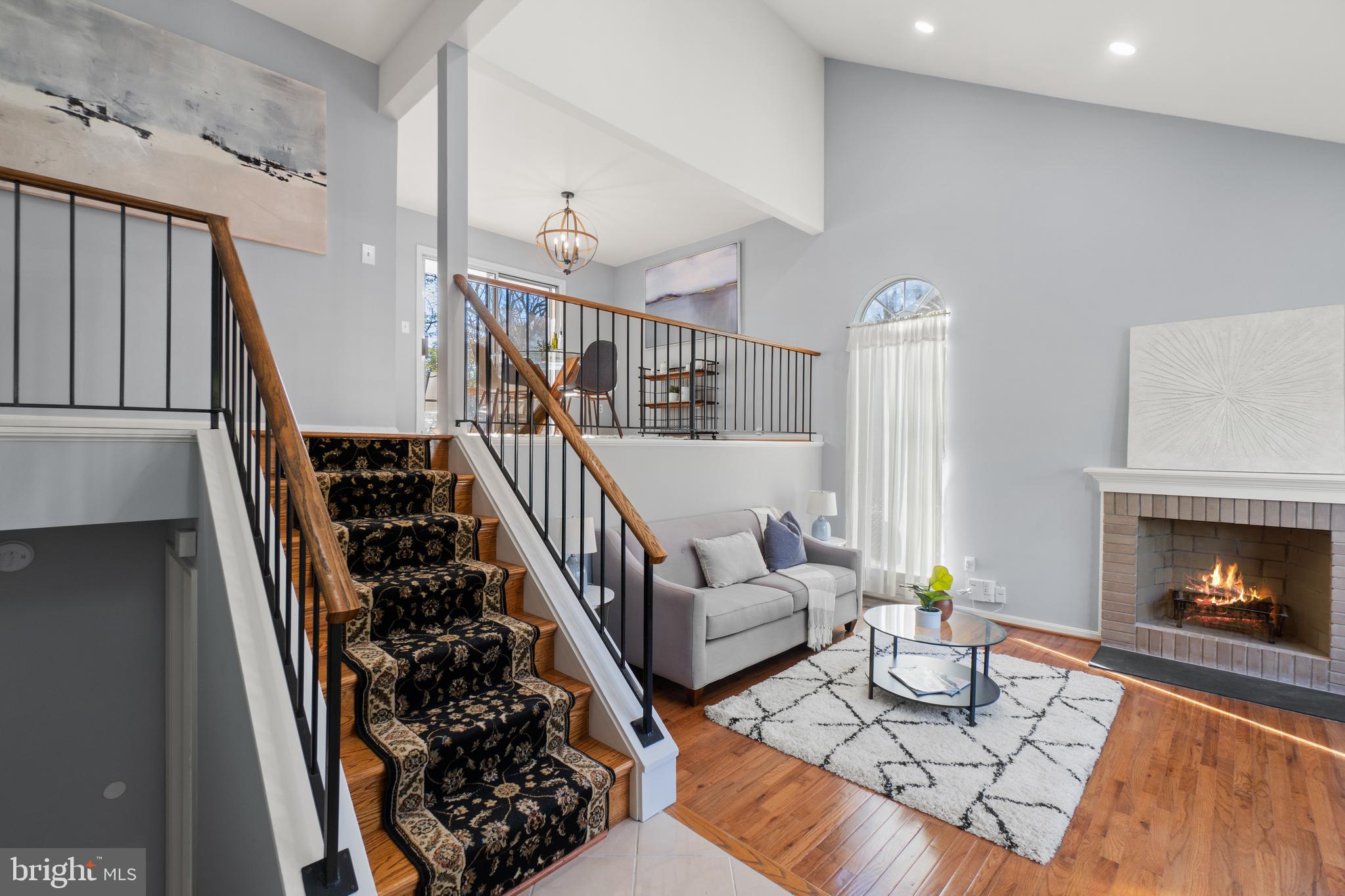 2430 Lyttonsville Road Silver Spring, MD 20910 - Photo 4 of 53 a living room with furniture and a fireplace