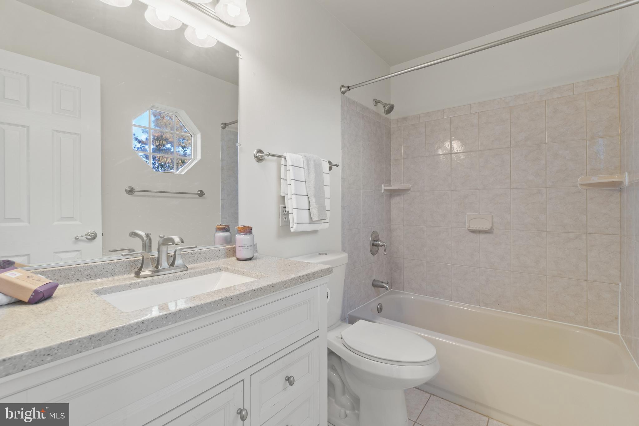 2430 Lyttonsville Road Silver Spring, MD 20910 - Photo 46 of 53 a bathroom with a sink a toilet and a bathtub