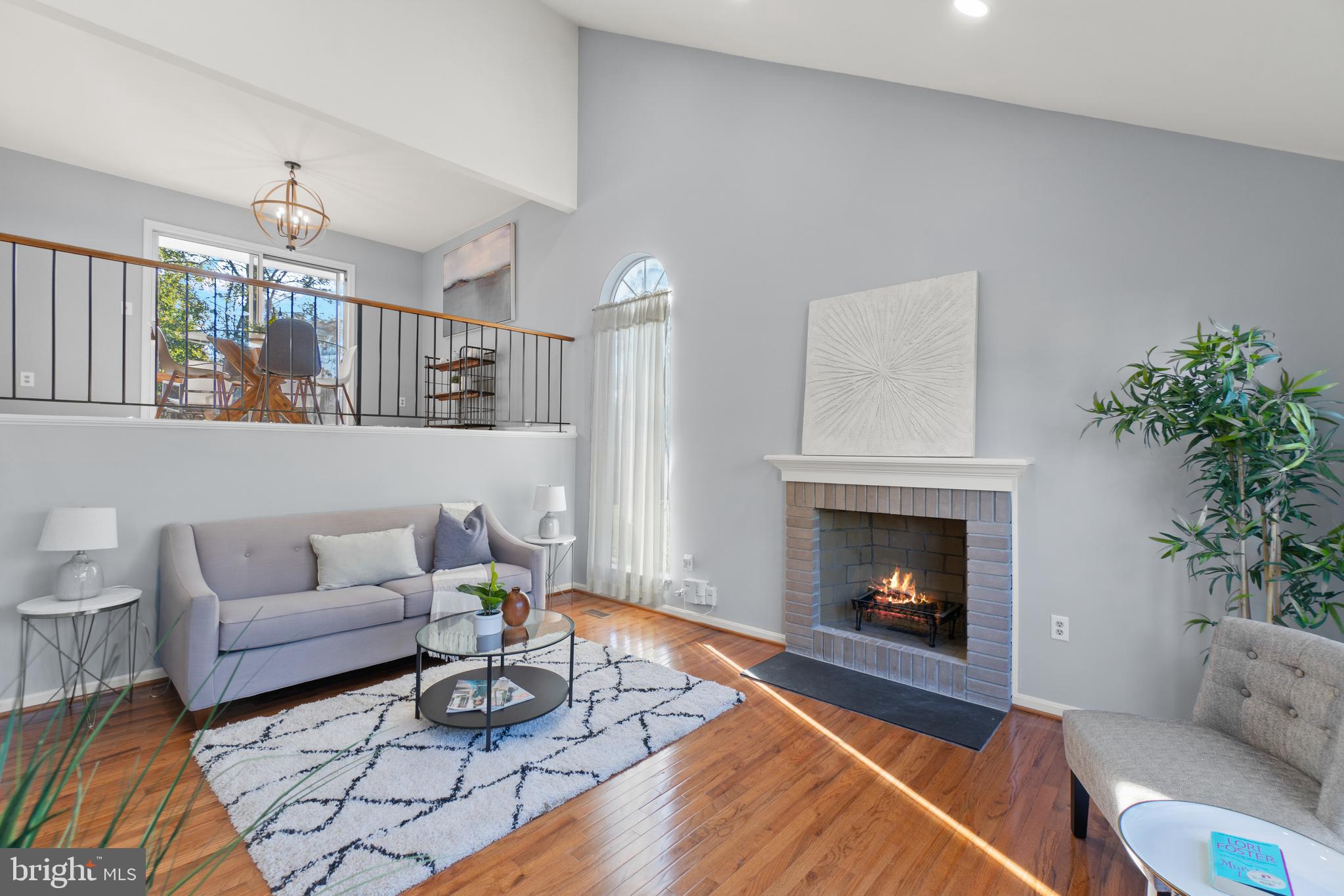 2430 Lyttonsville Road Silver Spring, MD 20910 - Photo 5 of 53 a living room with furniture and a fireplace