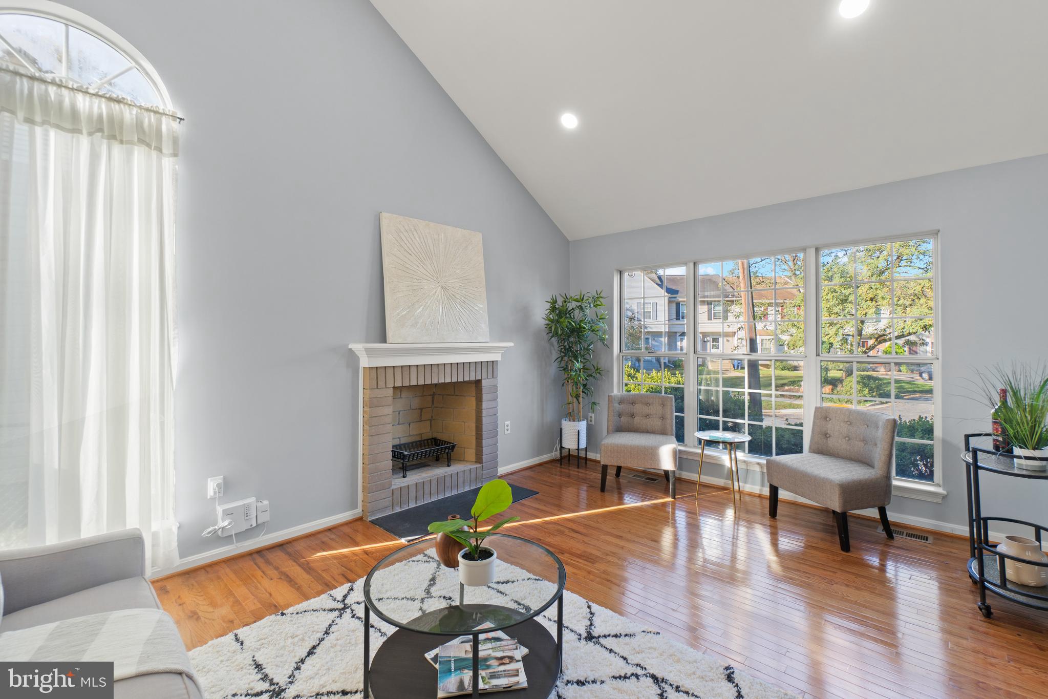 2430 Lyttonsville Road Silver Spring, MD 20910 - Photo 6 of 53 a living room with furniture and a fireplace