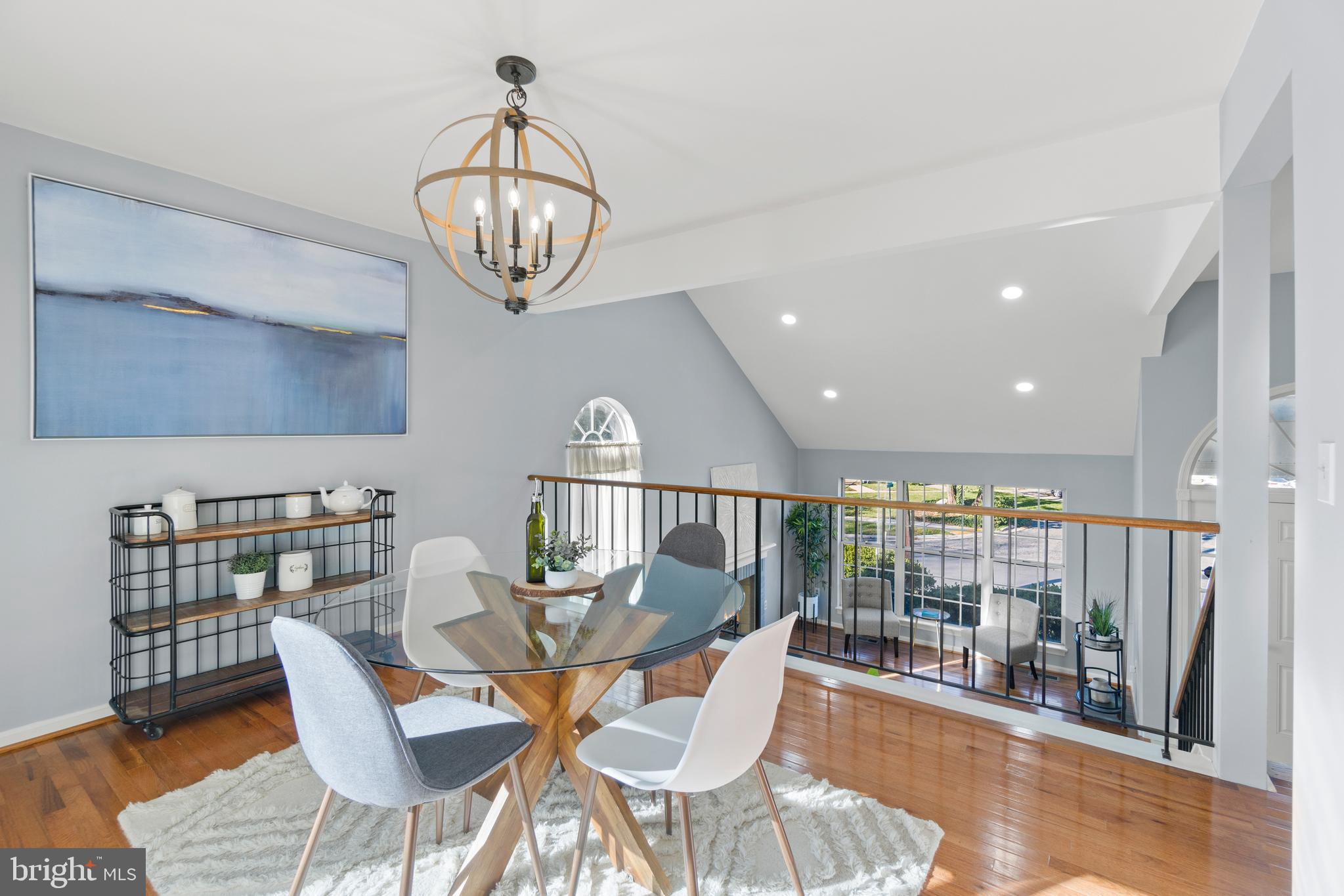 2430 Lyttonsville Road Silver Spring, MD 20910 - Photo 7 of 53 a view of a dining room with furniture wooden floor and a chandelier