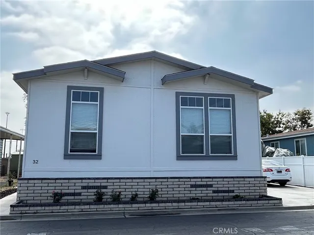 a front view of a house with garage