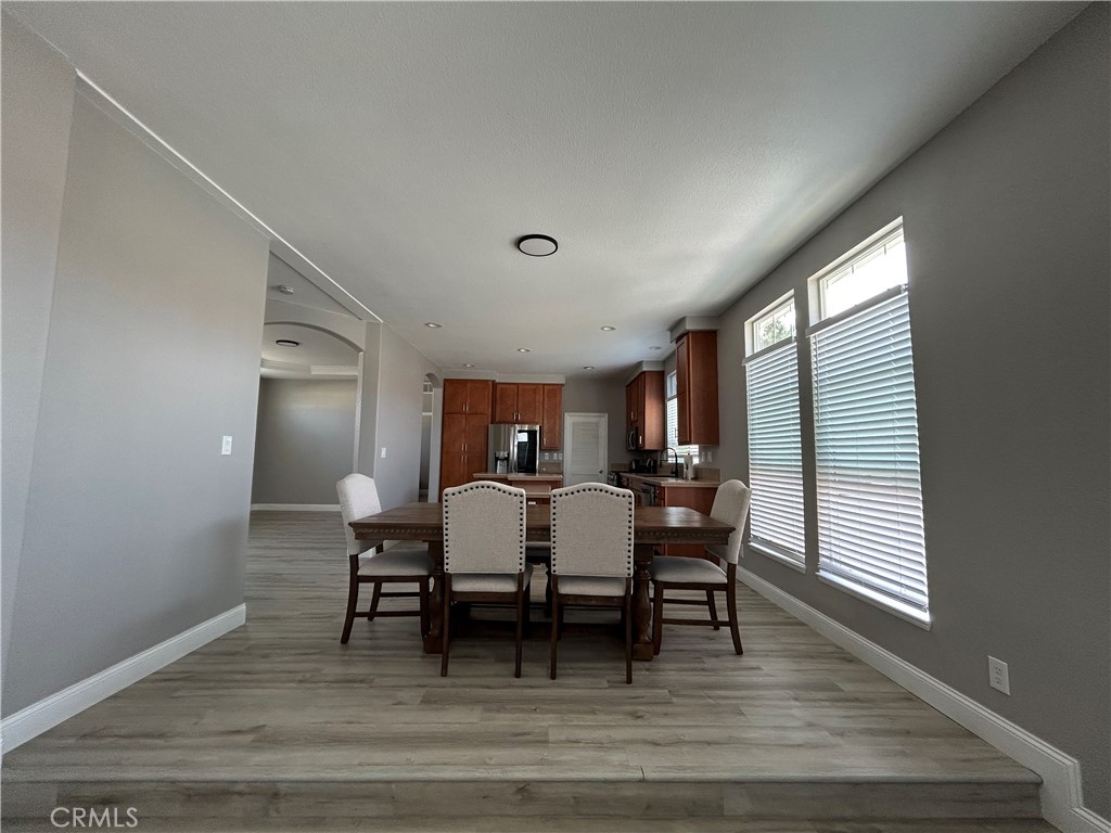 10550 Western Avenue, Unit 32 Stanton, CA 90680 - Photo 13 of 31 a view of a dining room with furniture and window
