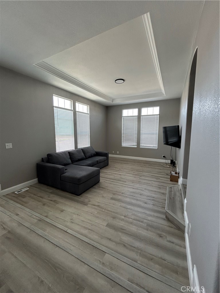 10550 Western Avenue, Unit 32 Stanton, CA 90680 - Photo 17 of 31 a living room with furniture and a large window
