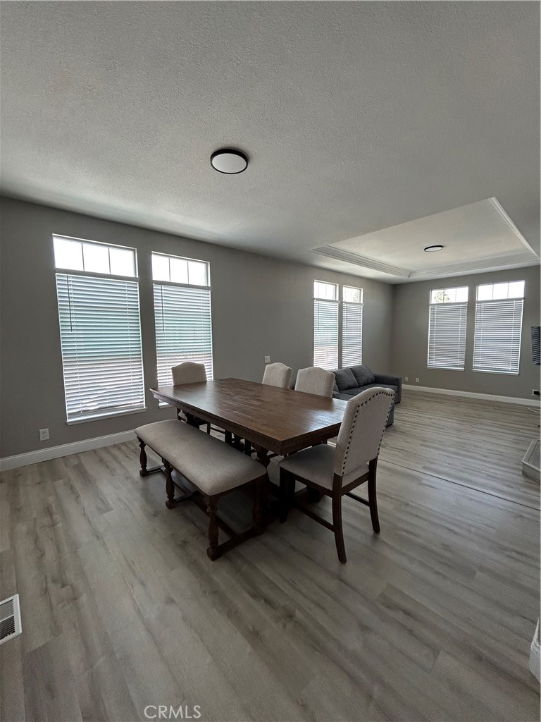 10550 Western Avenue, Unit 32 Stanton, CA 90680 - Photo 24 of 31 a room with furniture pool table wooden floor and windows