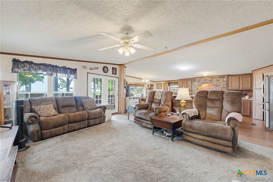 164 County Road 4450 Kempner, TX 76539 - Photo 9 of 44 a living room with furniture and a large window