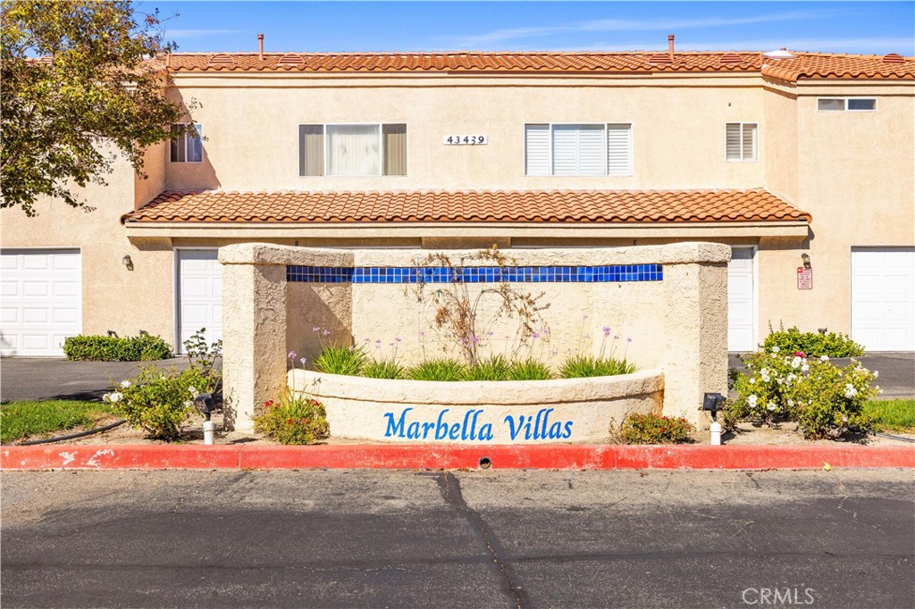 43413 30th Street West, Unit 3 Lancaster, CA 93536 - Photo 2 of 38 a street sign on a street view