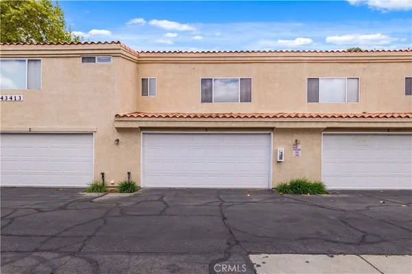 a view of a house with a garage