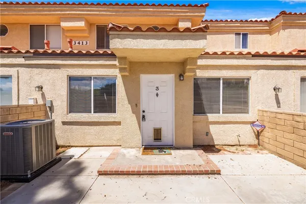 front view of a house with a balcony