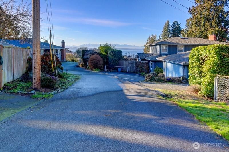 18822 Olympic View Drive Edmonds, WA 98020 - Photo 16 of 20 a front view of a house with garden