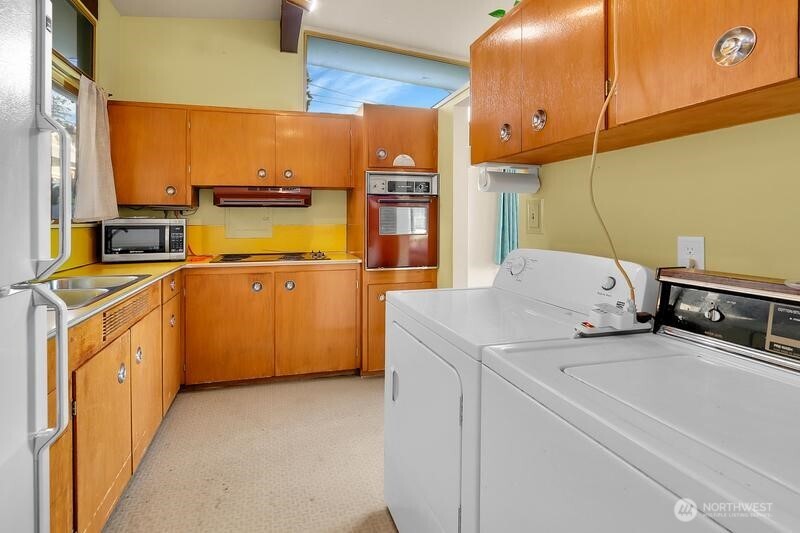 18822 Olympic View Drive Edmonds, WA 98020 - Photo 7 of 20 a utility room with dryer and washer