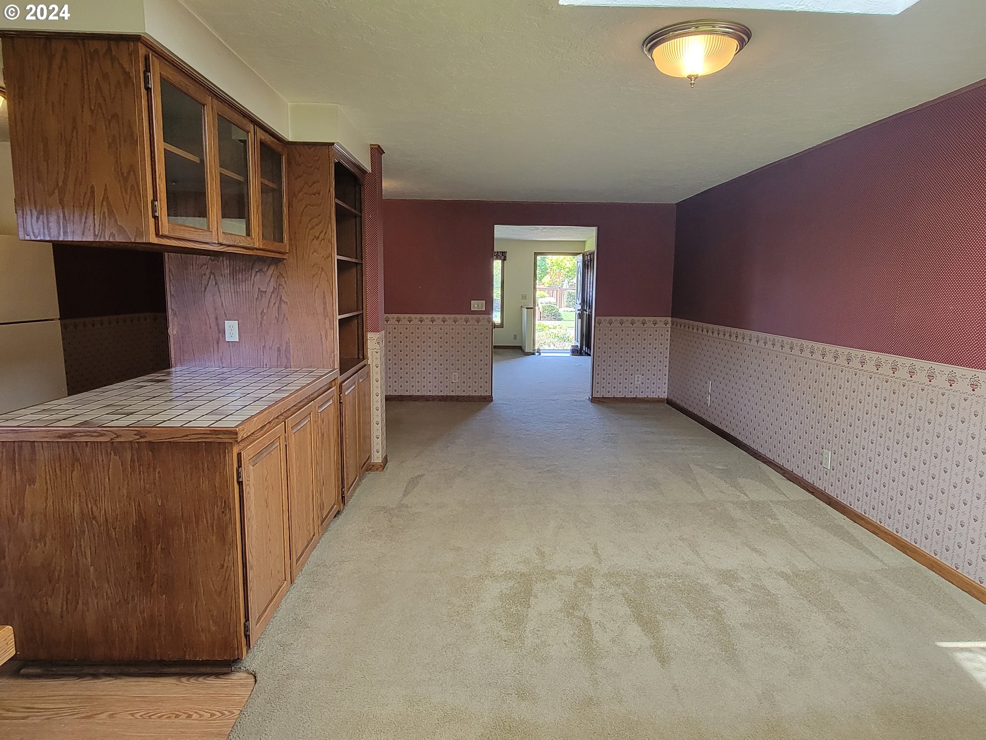 2565 Newcastle Street Eugene, OR 97404 - Photo 21 of 38 a kitchen with stainless steel appliances granite countertop a stove a sink and dishwasher